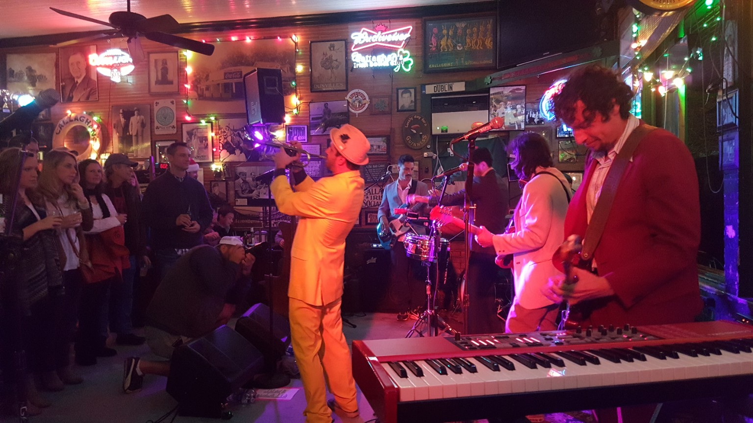 A band and audience filling the corner room at Callaghan’s